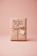 Blind Date with a Book — kraft paper wrapped book tied with twine